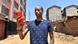 A Kenyan man holding a cellphone
