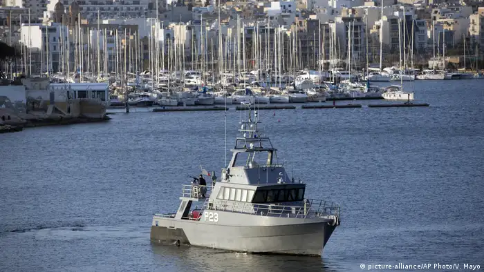 A Maltese Navy ship patrols in the harbor of Valletta, Malta on Thursday, Feb. 2, 2017