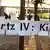banner that reads Hartz-IV Foto: Uli Deck dpa/lsw