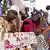 Frauen, deren Haut durch den Kontakt mit illegal deponiertem Giftmüll verätzt ist, protestieren während des Gerichtsverfahrens gegen die mutmaßlich Verantwortlichen in Abidjan (Archivfoto vom 29.09.2008). Rund zwei Jahre nach einem Giftmüllskandal im westafrikanischen Staat Elfenbeinküste mit 17 Toten hat ein Gericht in Abidjan den Hauptangeklagten zu 20 Jahren Haft verurteilt. Der Giftmüll war stattdessen illegal an 15 öffentlichen Stellen in Abidjan deponiert worden. 17 Menschen starben durch das Einatmen giftiger Gase, rund 100 000 Menschen mussten medizinisch behandelt werden. Teile des Mülls wurden bis heute nicht entsorgt. EPA/LEGNAN KOULA +++(c) dpa - Bildfunk+++
