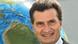 Guenther Oettinger stands in front of a globe in this July 2009 file photo Guenther Oettinger stands in front of a globe in this July 2009 file photo