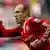 Arjen Robben celebrates after scoring against Eintracht Frankfurt