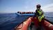 Migrants on a rubber boat in the Mediterranean Sea Migrants on a rubber boat in the Mediterranean Sea