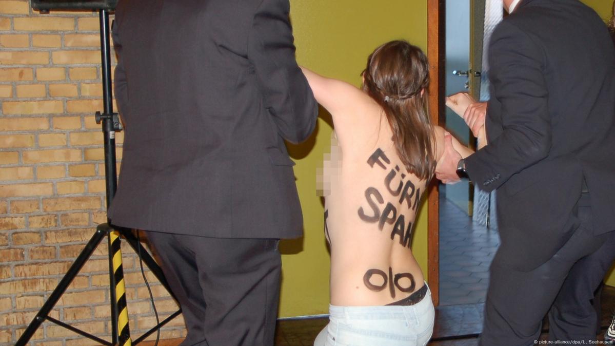 Naked feminist activists disrupt