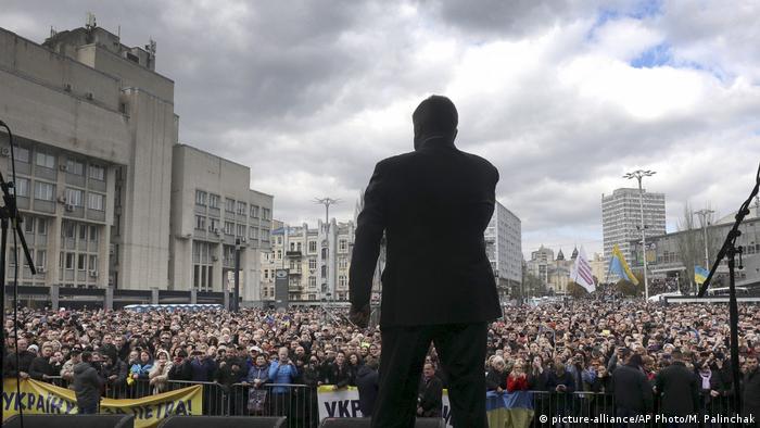 Ukrainian President Petro Poroshenko addresses a crowd at the Olympic Stadium in the capital Kyiv