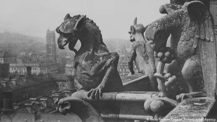 A gargoyle on notre Dame looks out on Paris (Getty Images/General Photographic Agency)