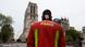 A firefighter in front of Notre Dame A firefighter in front of Notre Dame