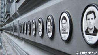 Row of photos on the exterior of the museum, depicting victims of the Hungarian State Security Authority