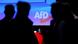 AfD members with a sign AfD members with a sign