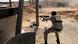A fighter loyal to Libya's Government of National Accord fires a weapon A fighter loyal to Libya's Government of National Accord fires a weapon
