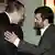 Iranian President Mahmoud Ahmadinejad, right, greets Turkish Prime Minister Recep Tayyip Erdogan