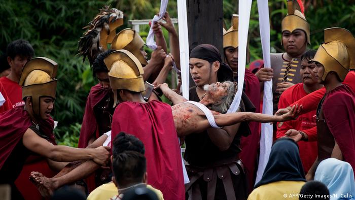 A man is pulled from the cross in the Philippines