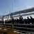 Cuban migrants queue to enter El Paso, Texas, for their appointment to request asylum in the U.S., at the Paso del Norte international border crossing bridge, in Ciudad Juarez, Mexico, April 1, 2019.