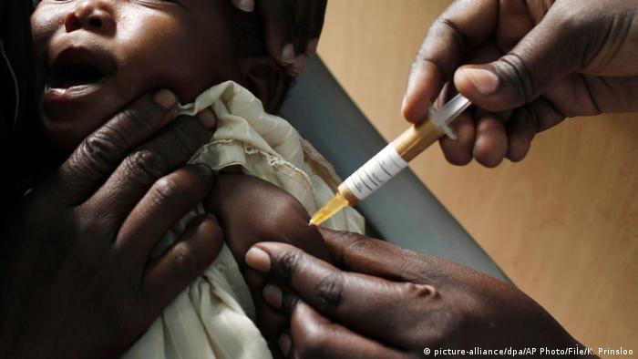A baby receives a new malaria vaccine