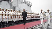 23.04.2019+++Qingdao, China+++
In this photo released by Xinhua News Agency, Chinese President Xi Jinping reviews an honor guard before boarding the destroyer Xining at a pier in Qingdao, east China's Shandong Province, Tuesday, April 23, 2019. Xi urged closer ties between the world's navies on Tuesday, amid tensions over China's rapid expansion of its naval forces and forceful assertions of territorial claims in the South China Sea. (Li Gang/Xinhua via AP) |