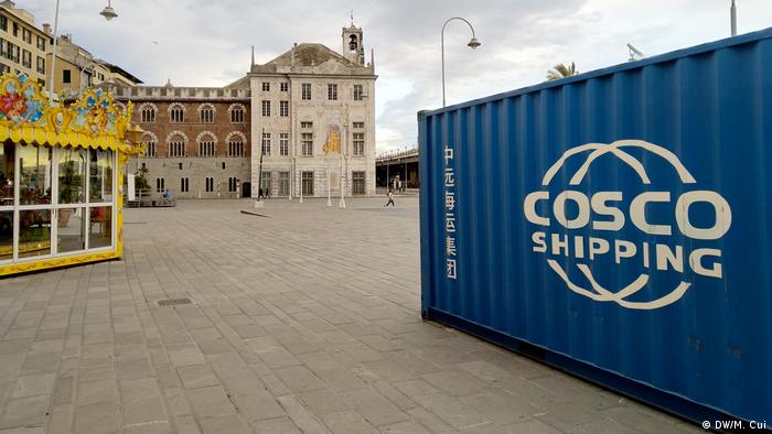 A COSCO container sits in the port of Genova