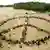 Some 3,000 people form a giant peace sign during an Easter protest gathering near the eastern German town of Wittstock