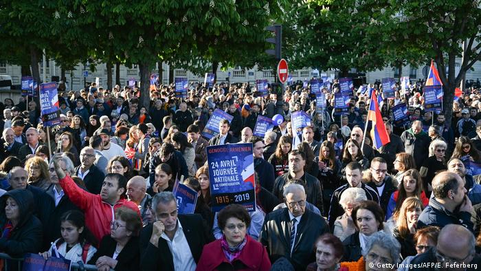 Armenians on the Place du Canada in Paris mark the 104th anniversary of the genocide
