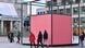 People walking around a pink cube which is the installation "Gropius Room Pavilion" People walking around a pink cube which is the installation "Gropius Room Pavilion"