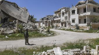 Разрушенные здания в окрестностях Алеппо 