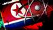 The North Korea flag behind the atomic symbol The North Korea flag behind the atomic symbol