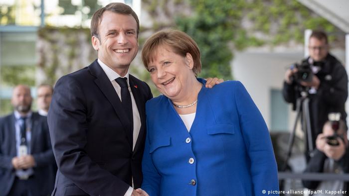 Rivaliteti i fshehur mes Francës dhe Gjermanisë është bërë shkak për bllokimin e procesit të zgjerimit, thotë Bodo Weber. Macron dhe Merkel në Belrin, me rastin e samitit të Ballkanit Perëndimor. 