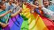 People in Delhi holding LGBTQ rainbow flag People in Delhi holding LGBTQ rainbow flag