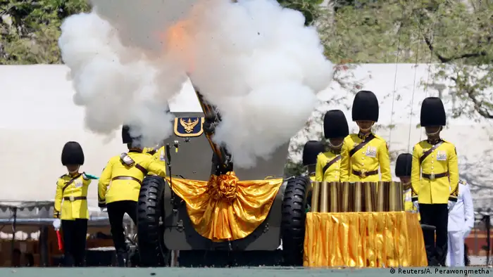 Cannon being fired by Royal Guards (Reuters/A. Perawongmetha)