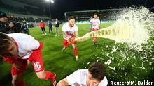 Soccer Football - 2. Bundesliga - Greuther Fuerth v FC Cologne - Sportpark Ronhof Thomas Sommer, Fuerth, Germany - May 6, 2019 FC Cologne's Marco Hoger celebrates with beer after being promoted to the Bundesliga REUTERS/Michael Dalder DFL regulations prohibit any use of photographs as image sequences and/or quasi-video TPX IMAGES OF THE DAY