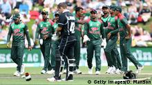 DUNEDIN, NEW ZEALAND - FEBRUARY 20: Bangladesh celebrate the dismissal of Ross Taylor of the Black Caps during Game 3 of the One Day International series between New Zealand and Bangladesh at University Oval on February 20, 2019 in Dunedin, New Zealand. (Photo by Dianne Manson/Getty Images)