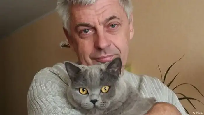 Vadym Komarov with his cat (private photo)