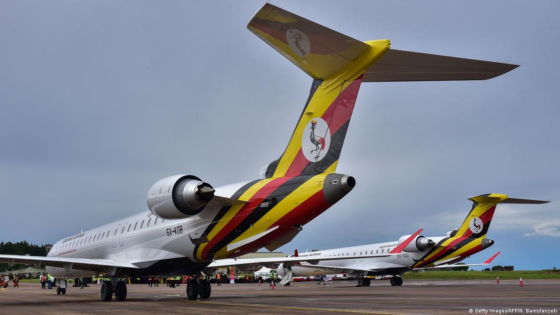 Two Bombardier CRJ900 aircraft are already based at Entebbe airport outside Kampala, waiting for flights to beginImage: Getty Images/AFP/N. Bamulanzeki