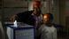 A woman, accompanied by a young relative, casts her ballot in Johannesburg, South Africa A woman, accompanied by a young relative, casts her ballot in Johannesburg, South Africa
