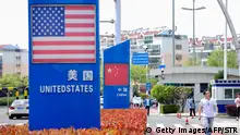 08.05.2019
Signs with the US flag and Chinese flag are seen at the Qingdao free trade port area in Qingdao in China's eastern Shandong province on May 8, 2019. - China said on May 7 its top trade negotiator will visit the United States for talks with their US counterparts this week even as Washington stepped up pressure with plans to hike tariffs and complaints that Beijing was backtracking on its commitments. (Photo by STR / AFP) / China OUT (Photo credit should read STR/AFP/Getty Images)