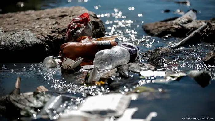 Plastic and other waste litter the banks of the Jukskei River