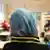 A Turkish girl wearing a headscarf in school