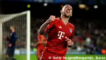 BARCELONA, SPAIN - MAY 01: Franck Ribery of Munich celebrates after Gerard Pique of Barcelona scores an own goal to make the score 2-0 during the UEFA Champions League semi final second leg match between Barcelona and FC Bayern Muenchen at Nou Camp on May 1, 2013 in Barcelona, Spain. (Photo by Lars Baron/Bongarts/Getty Images)
