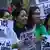 Asiatische Hausangestellte demonstrieren für mehr Rechte (Foto:DW-TV)