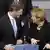 Merkel and Westerwelle speaking ot one another