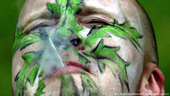 Weed smoker with a face painting