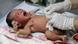 A new-born baby in Cambodia's capital, Phnom Penh A new-born baby in Cambodia's capital, Phnom Penh