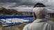A man looks at coffins before burying the remains of Holocaust victims at a cemetery just outside Brest, Belarus A man looks at coffins before burying the remains of Holocaust victims at a cemetery just outside Brest, Belarus