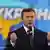 Виктор Янукович на фоне карты Украины
