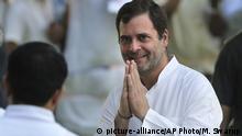 Congress Party President Rahul Gandhi, greets people during a function to pay homage to their father and former Indian prime minister Rajiv Gandhi on his death anniversary in New Delhi, India, Tuesday, May 21, 2019. (AP Photo/Manish Swarup) |