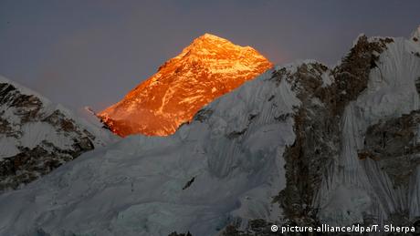 Himalayan mountains, with Mount Everest lit up by the sun 