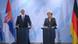 Serb President Boris Tadic alongside German Chancellor Angela Merkel. Serb President Boris Tadic alongside German Chancellor Angela Merkel.