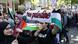 A person hold a banner reading Free Palestine at the Quds Day march in Berlin A person hold a banner reading Free Palestine at the Quds Day march in Berlin