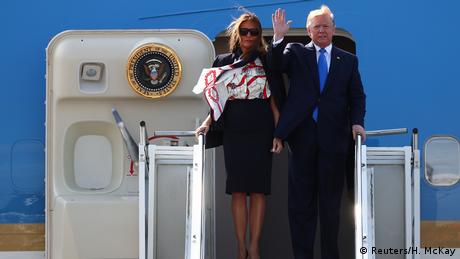 Donald and Melania Trump exit Air Force One (Reuters/H. McKay)
