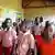 Young children sing in a Ugandan school