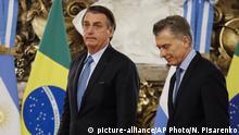 Brazil's President Jair Bolsonaro left, and Argentina's President Mauricio Macri arrive at the government house in Buenos Aires, Argentina, Thursday, June 6, 2019. (AP Photo/Natacha Pisarenko) |